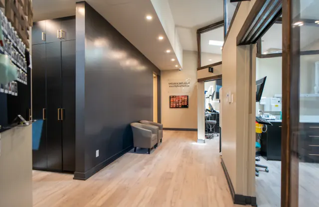 Modern corridor with private treatment rooms at My New Teeth