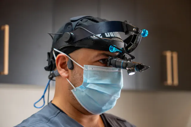 Cookstown dentist wearing precision magnification loupes