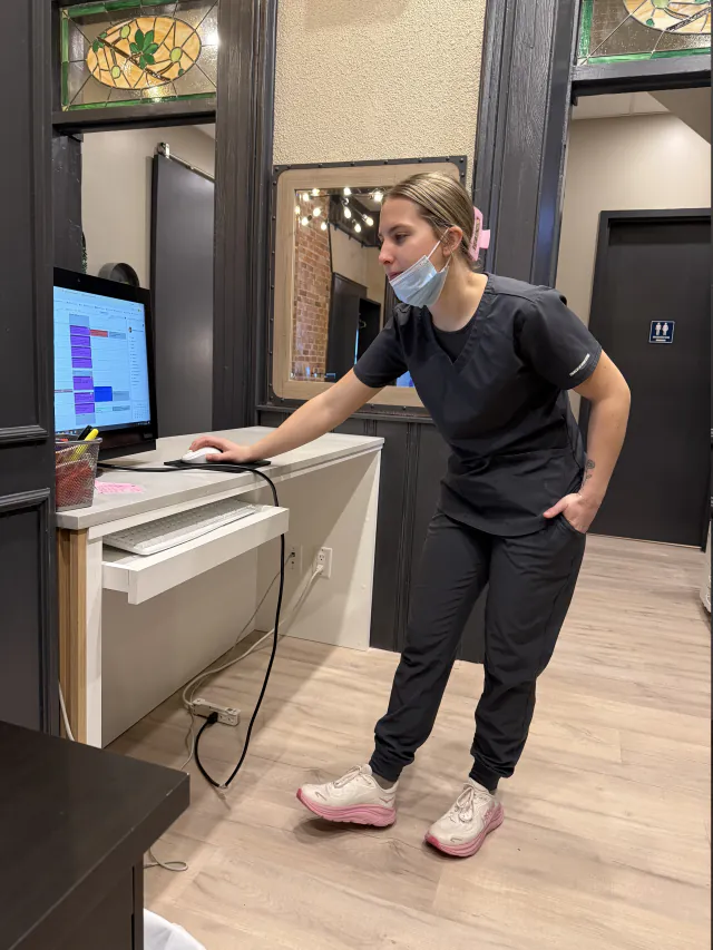 Dental team member coordinating patient care at My New Teeth