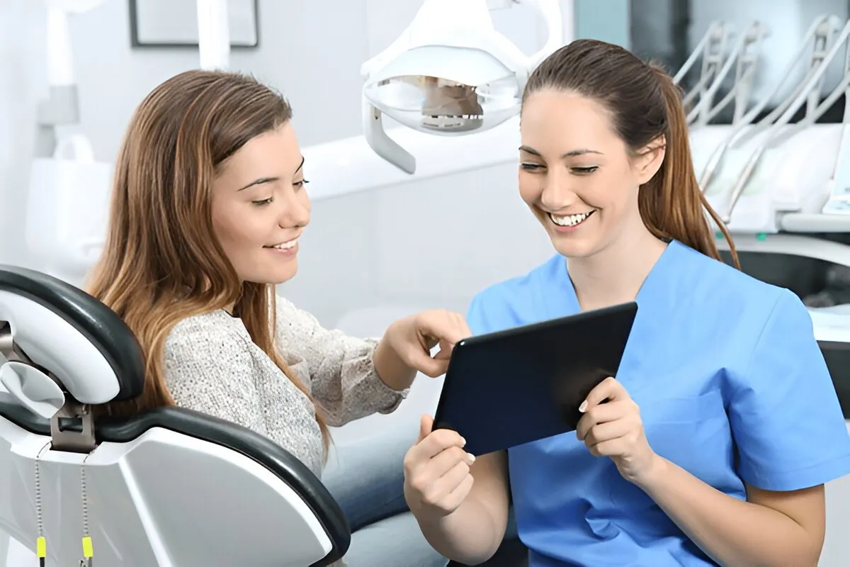 Patient reviewing dental information with a dental professional