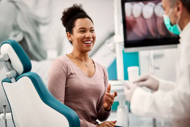 A patient smiling confidently