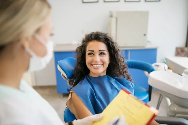 New patient speaking with a dental professional